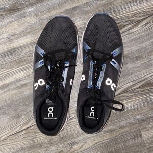 On Running Black Athletic Shoes with CloudTec Cushioning